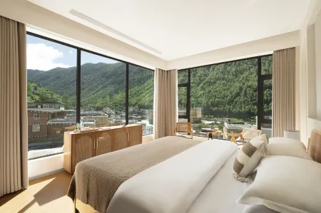 Mushan Yingxue Holiday Bieyuan (Siguniangshan Changpinggou Scenic Area) Отели рядом с достопримечательностью «Changpingcun»