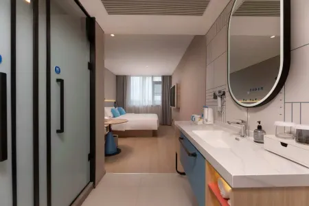 Home Inn (Wuxi Binhu Wanda Plaza Rongxiang Subway Station Branch) Отели рядом с достопримечательностью «Wuxi College of Vocational Technology (Qian'ou Road)»