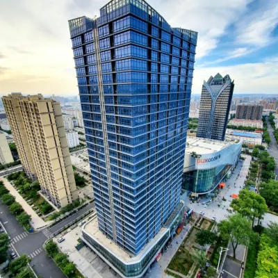 Shengji City Apartment (Huzhou Olympic Sports Center Wuyue Plaza) Hotels near Huzhou City Planning Exhibition Hall