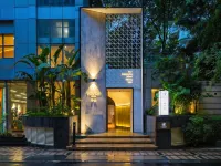 YOVAN · Yuwan Hotel Hotels in A red building/Pleasure City business district