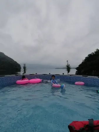 Laoshan Xihai Aixin Villa Lakeside Resort Отели рядом с достопримечательностью «Feiwei Food Wenchuangyuan, Yulin Old Town»