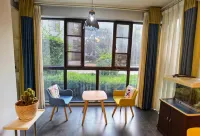 Mile Walk Homestay (Qinglai Park)