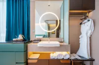 รูบี้โรส เรเซน รีทรีต โรงแรมใกล้ศูนย์กีฬาชิงเต่าสนามกีฬา