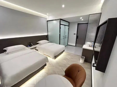 Mengzi Xuanlu Business Hotel (Nanhu Park Xintiandi Pedestrian Street) Отели рядом с достопримечательностью «Honghe College»