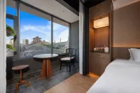 Luoshen Bronze Magpie Hotel (Luoyang Yingtianmen Branch) - شرفة