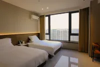 Yixiu Smart Homestay (Municipal Administrative Center Subway Station) Hotels in New Urban Area