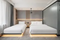 Yunan Business Hotel (Taoxian Airport Shenyang Conservatory of Music)