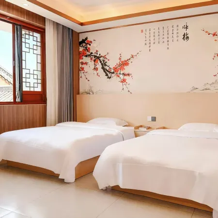 Shengshi Huiyao Hotel (Yi Ancient Town) Отели в г. Чусион