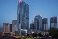 Junyi Hotel Apartment (Qingdao May Fourth Square Vientiane City) - Condos