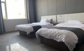 Shengji Business Hotel (Yucheng South Toll Gate)