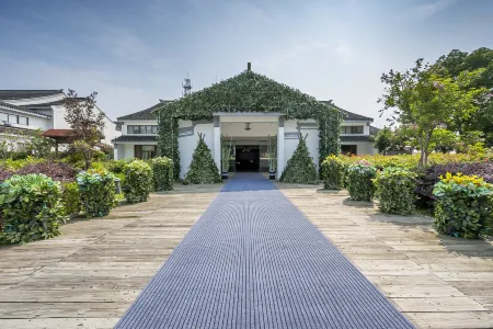 Villa Rhyme Taihu Lake Fishing Pool BBQ Manor Villa (Dongshan Grandma Bridge Branch) Отели рядом с достопримечательностью «Ботанический сад Цзяньнан»