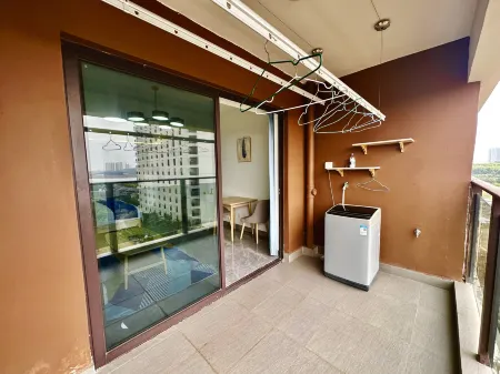 Yuhai Guanxuan Apartment (Xuwen Hai'an New Port Ferry Terminal) Отели в г. Сюйвэнь