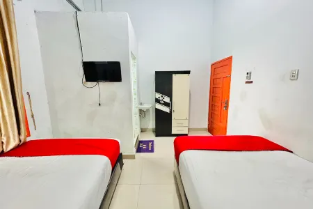 Shinta Guesthouse Отели в г. Tanjung Morawa