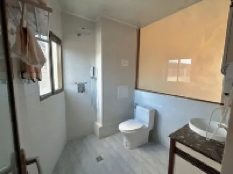 Distant Home Sanjin Inn Hoteles cerca de Baishuitai