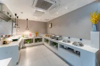 Manston Holiday Hotel (Wuhu Anhui Normal University Huajin Campus International Exhibition Center) - فطور