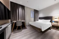 Muzi Xuanxuan Hotel (Wuxi Huaqing Bridge Subway Station People's Hospital) - romantici