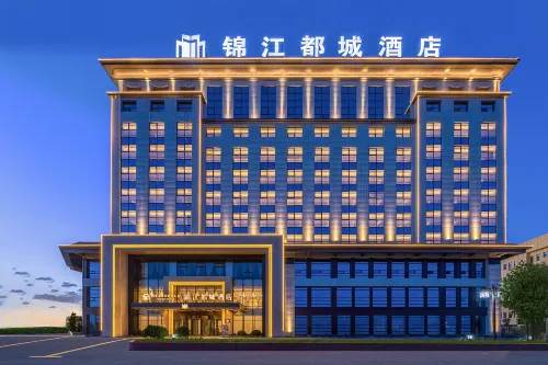 錦江都城酒店（哈密火車站乘客集散中心文創園店） - 停車場