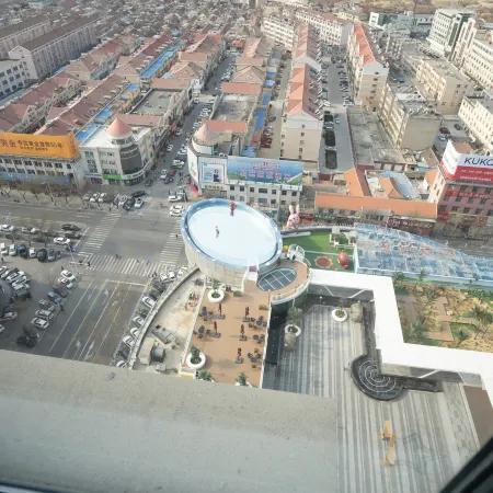 Longkou LanOuShangPin Hotel (Bosshang Shopping Plaza)