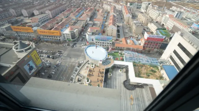 Longkou LanOuShangPin Hotel (Bosshang Shopping Plaza)