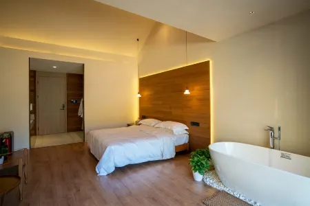 Mijing Fengshe (Jikepulin Ski Resort Dong Area) Отели рядом с достопримечательностью «Hemu Scenic Area»