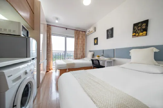 Jimei Xueju Select Apartment (Shanghai Minhang Jiaotong University Huashi University) Отели рядом с достопримечательностью «Auxiliary Wharf of Shuitou International Rock City»