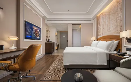 Vienna International Hotel Luoyang Longmen High-Speed Rail Municipal Government Отели рядом с достопримечательностью «Luoyang New District Gymnasium»