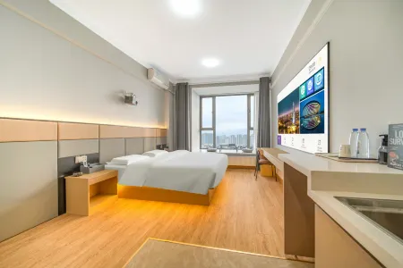 Baihualin Hotel (Xingyang Wuyue Plaza Zhengzhou West Railway Station) Отели рядом с достопримечательностью «Xingyang People's Park»