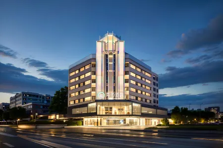 qingtujiudian Отели рядом со станцией Xuwen Railway Station