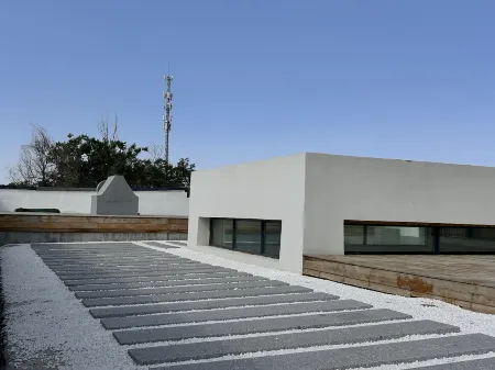 Jimsar Xiaofenzi Art Gallery Homestay Отели рядом с достопримечательностью «Thousand-Buddha Cave»