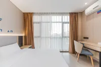 Home Inn Pebble Hotel (Yangzhou University - Slender West Lake Scenic Area Branch) - 2-نجوم