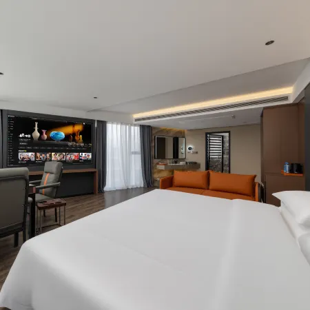 Moshang Light Luxury City View Tea Hotel (Xinyang Railway Station)