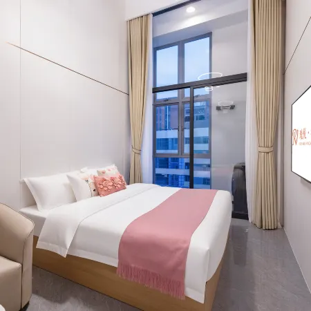 Guiyue Binzhi Apartment (Guangzhou Lingnan College Tianhe Smart City Branch) Отели рядом с достопримечательностью «Guangzhou Flying Over the Jungle Adventure Park»