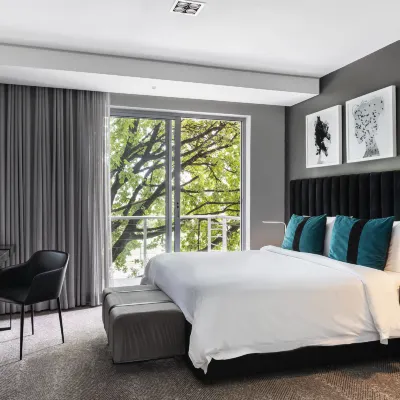 The Capital Empire Hotels near Rhodes Park