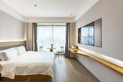 M+hotel Отели рядом с достопримечательностью «Shanghai Jiangnan Tianyuan Chamber»