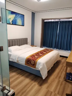 原陽花海雲宿（原陽駕校店） Отели в г. Юаньян