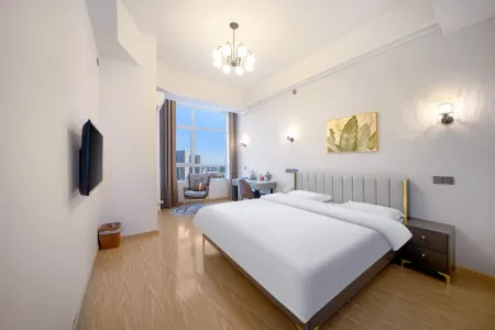 Changchun Yicheng Huayi Shopping Plaza Jusen Hotel Отели рядом с достопримечательностью «Changchun Workers Gymnasium»