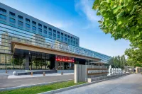 Shanxi International Sports Exchange Center. Hotel MoMc (Red Lantern Stadium) Hotels in Taiyuan Ancient County/Jinci Temple