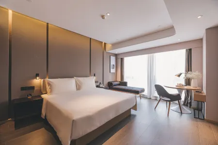 Shanghai Xujiahui Stadium Treasure Hotel Отели рядом с достопримечательностью «Longhua Temple»