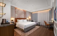 Vienna International Hotel (Yangzhou Jiangdu Outlets Plaza Store） Hotel in zona Jiulong Brake