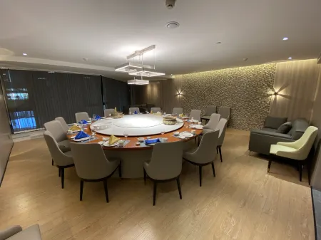 Baogang Hotel Отели рядом с достопримечательностью «A'erding Botanical Garden»