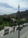 Meixian Qishangge Hotel