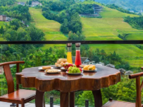 논의 파노라마 전망을 즐기세요 (룽성 룽지 계단식논 지점) 룽성 호텔