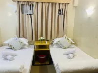Hong Kong Holiday Guest House - Inns