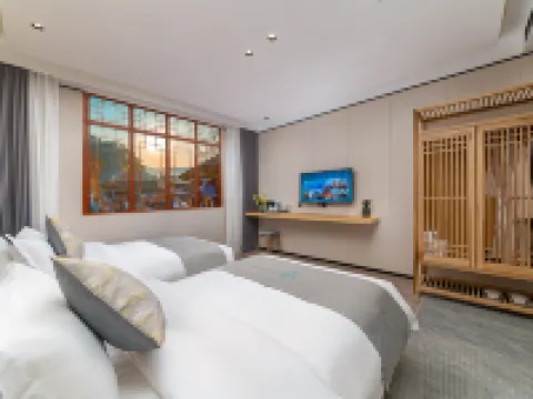 สาขาเหวินลี่หยวน (เขตทิวทัศน์เมืองโบราณเฟิ่งหวง ฮงเซียว) โรงแรมในเฟิ่งหวง