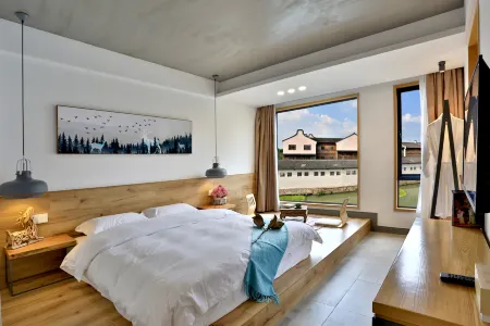 Wuzhen Yuyin Courtyard Design Hotel (South Gate of Xizha Scenic Area) Отели рядом с достопримечательностью «Fu'an Bridge»