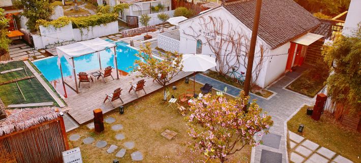 NA NIAN WAN CUN Courtyard GetawayHOME INN โรงแรมในถงเซียง