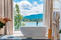 The mountain and the water embrace the Pleasant Bay Homestay