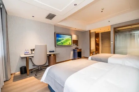 LANOU Hotel (Huangshi Yingbin Avenue Huahu Railway Station) Отели рядом с достопримечательностью «Hubei Normal University»