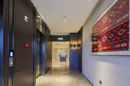 Berkshire International Hotel (Xinhua Ideal City Store at Enshi Airport)