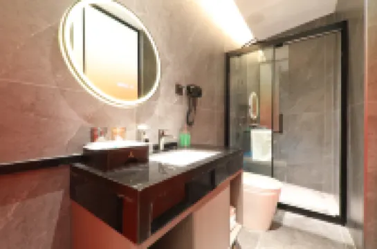 Yixin Design Hotel (Guangchang Bus Station)